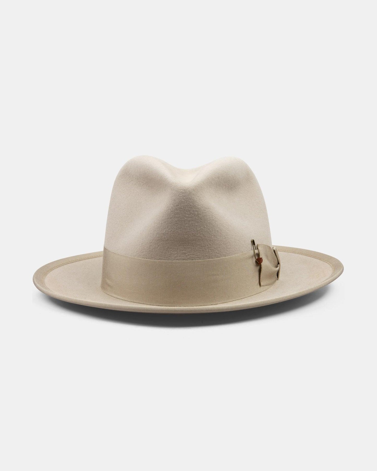 Light beige felt fedora hat with wide brim and grosgrain ribbon band on white background