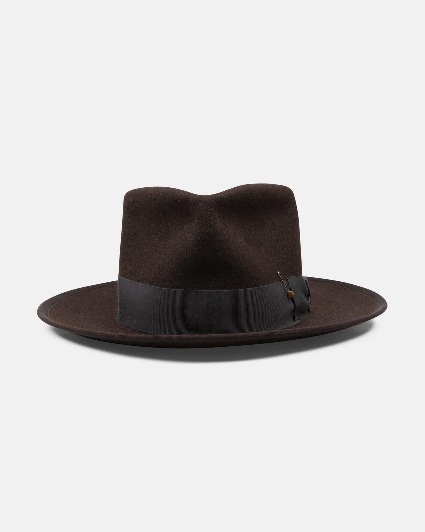 Dark brown felt fedora hat with wide brim and black ribbon band on white background