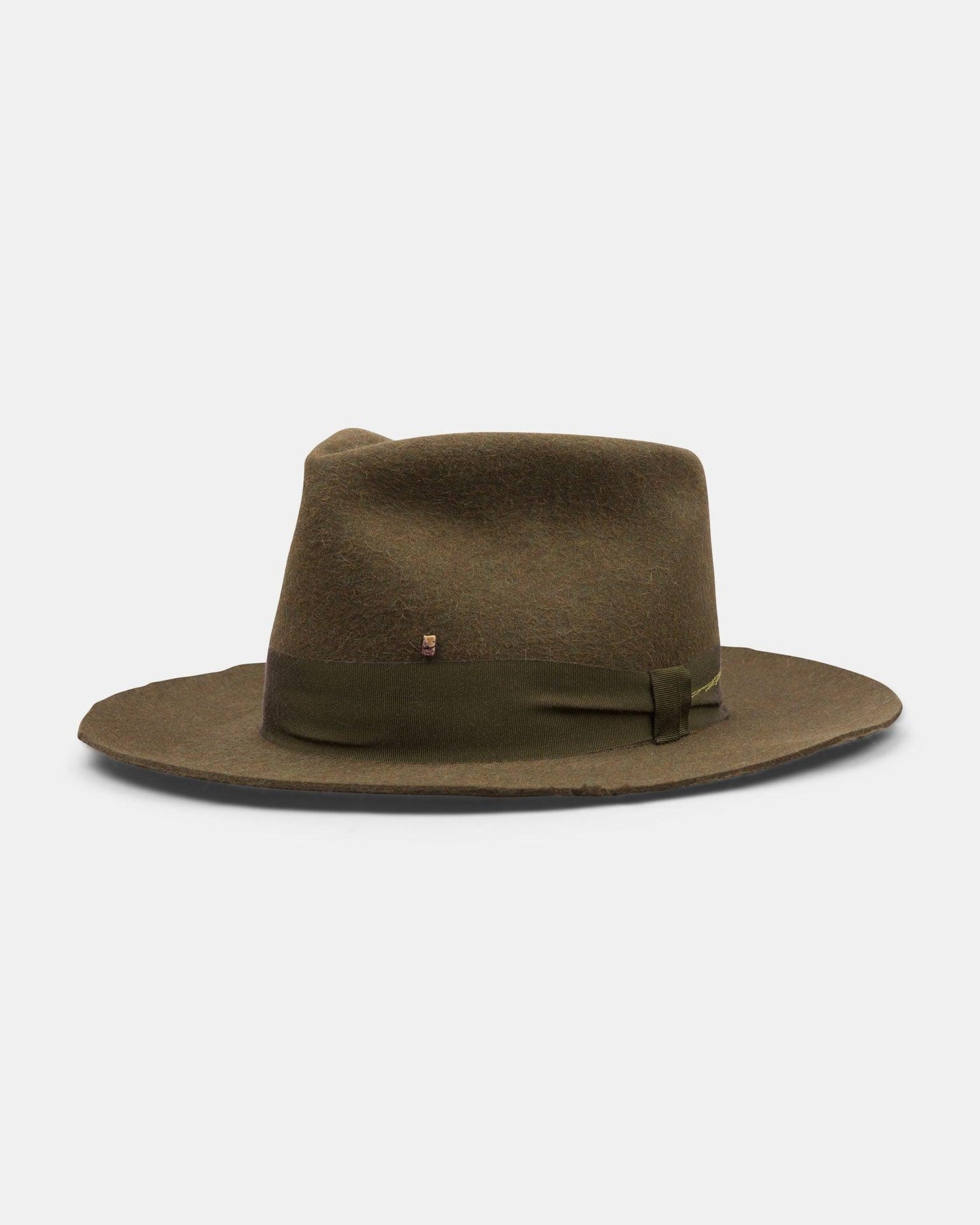 Handmade olive green felt fedora hat with wide brim and ribbon band on white background