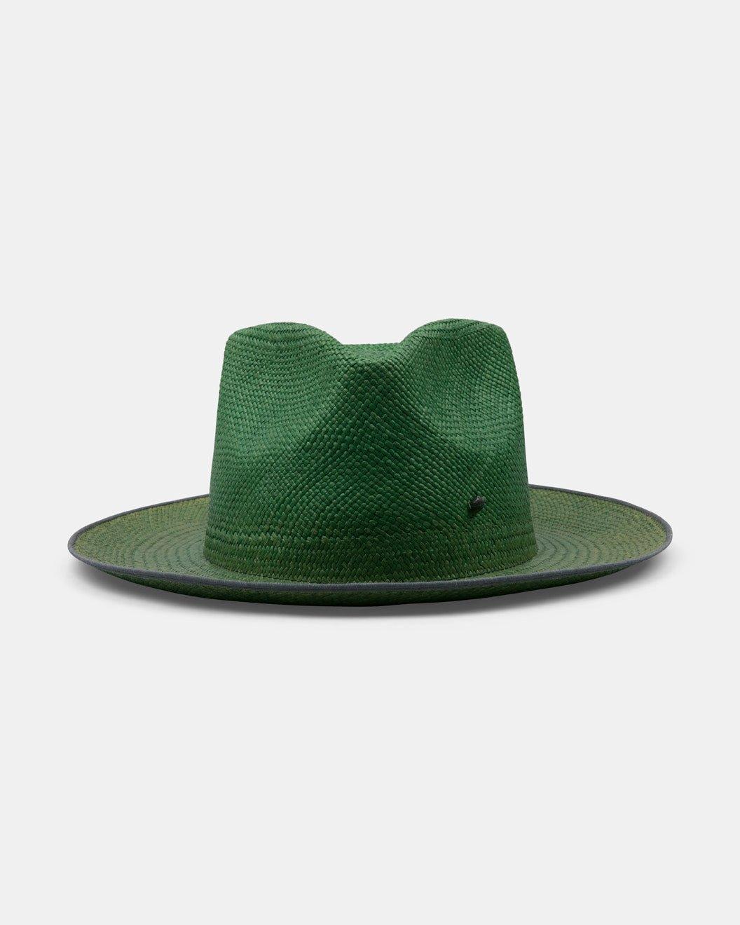 Green handmade Panama hat with wide brim and classic crown on white background