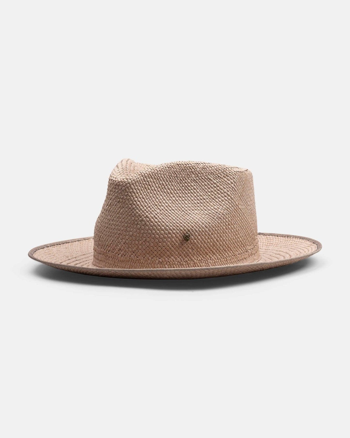 Natural straw Panama hat with wide brim and textured weave on white background