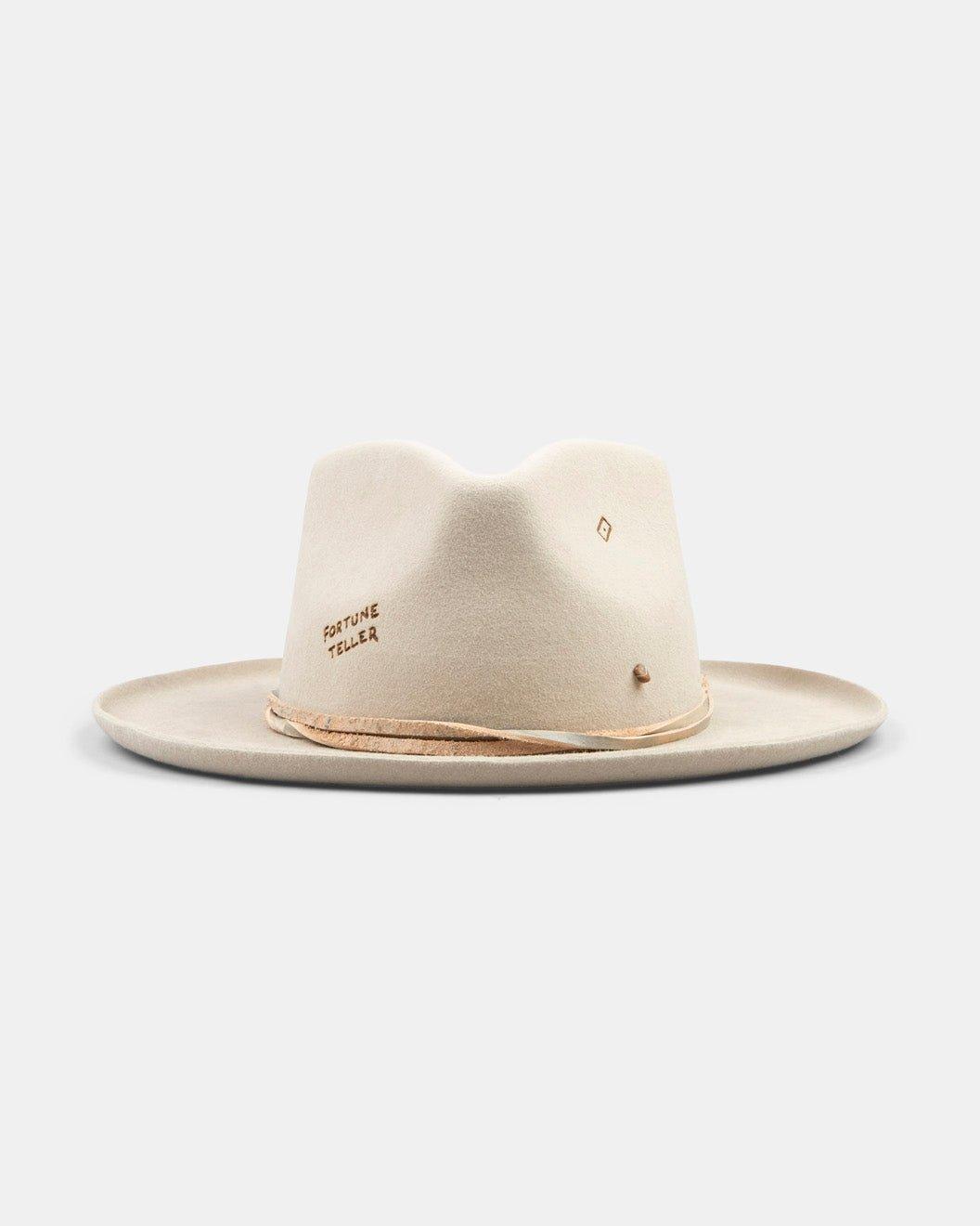 Handmade beige felt hat with wide brim, side text reading 'Fortune Teller', and natural trim