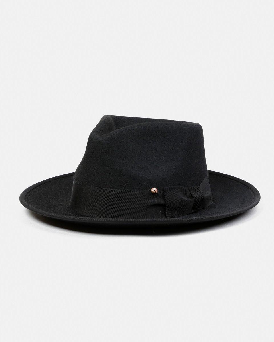 Black felt fedora hat with wide brim and grosgrain ribbon on white background