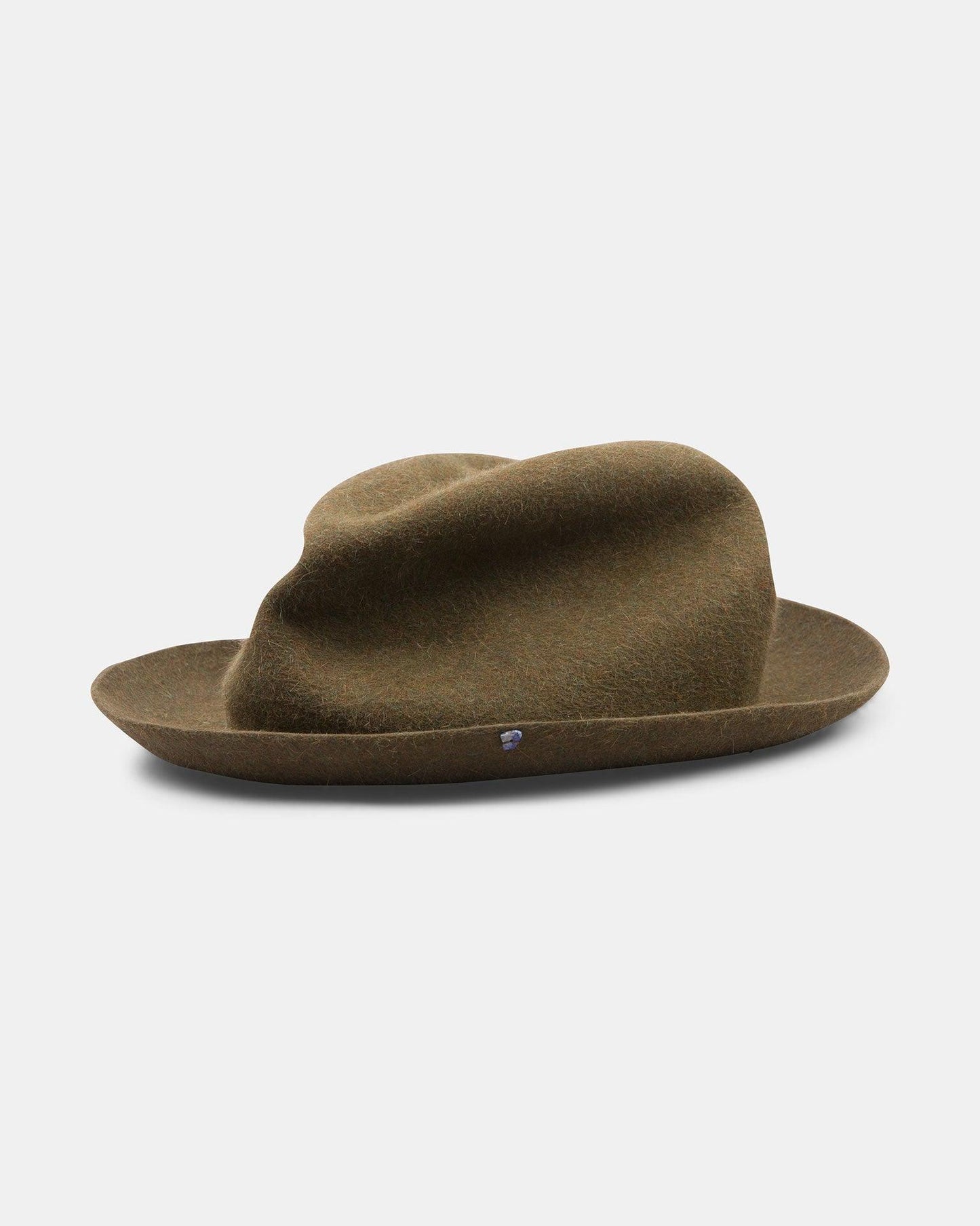 Olive green felt fedora hat with asymmetrical crown and wide brim on white background