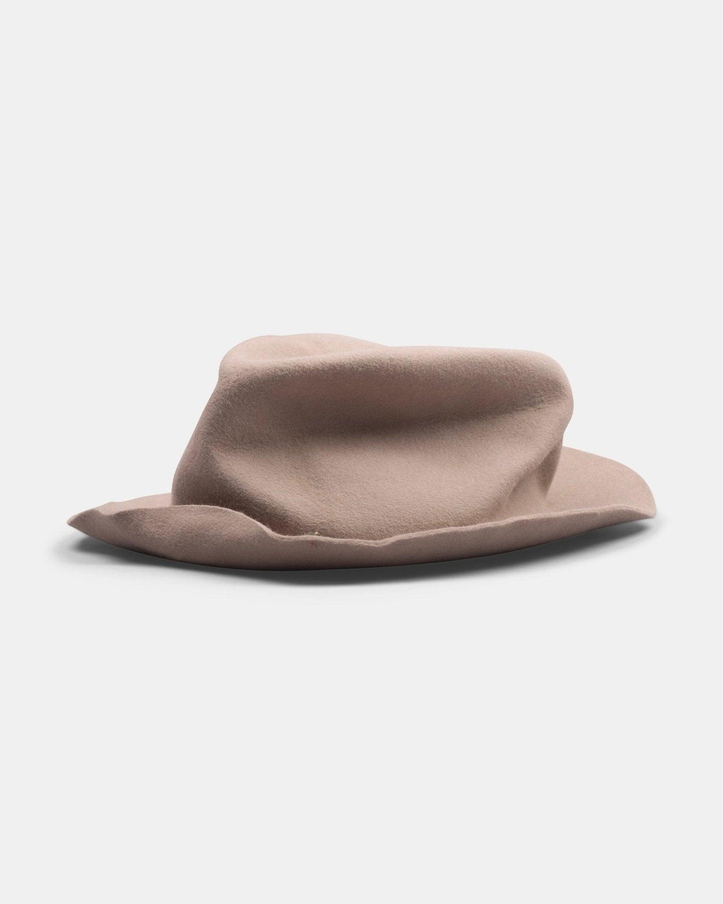 light tan felt fedora hat with a soft, wide brim and unstructured crown on white background